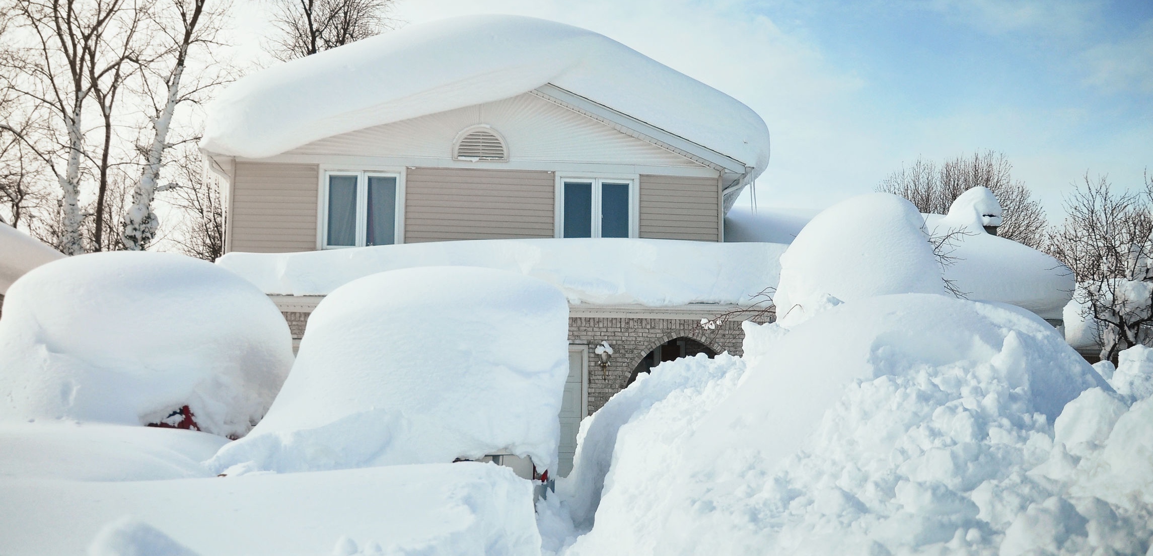 House covered in thick snow